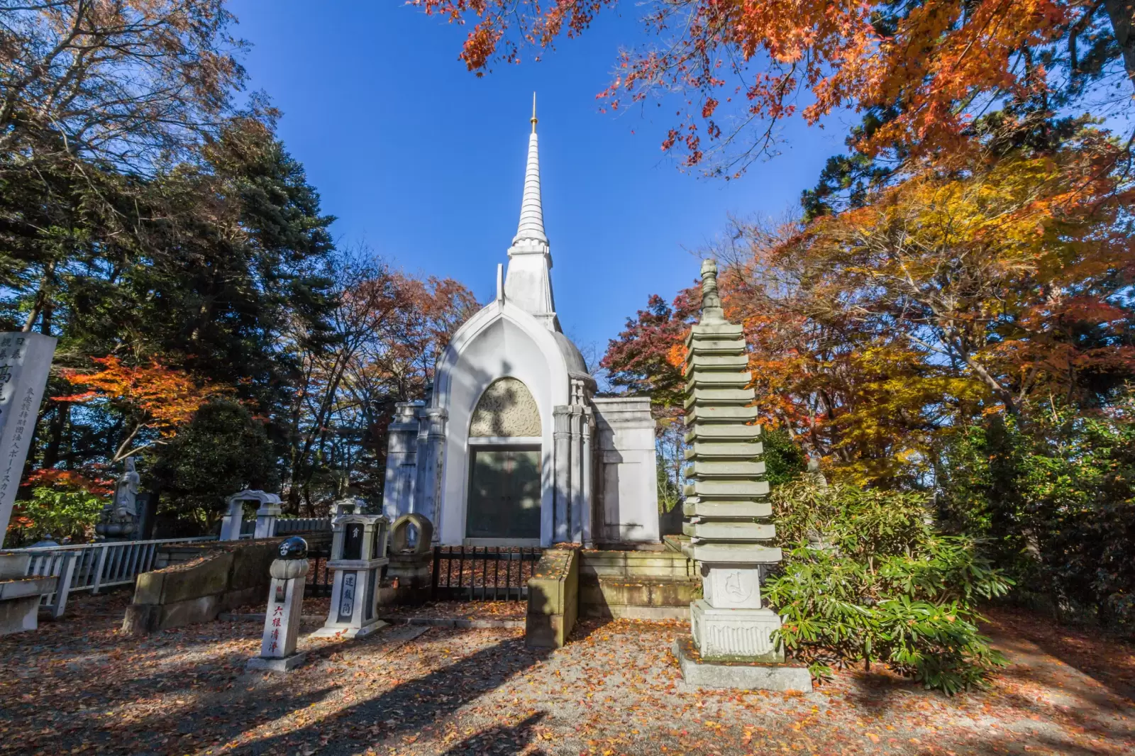 buddhist stupa at mount takao in autumn in tokyo japan