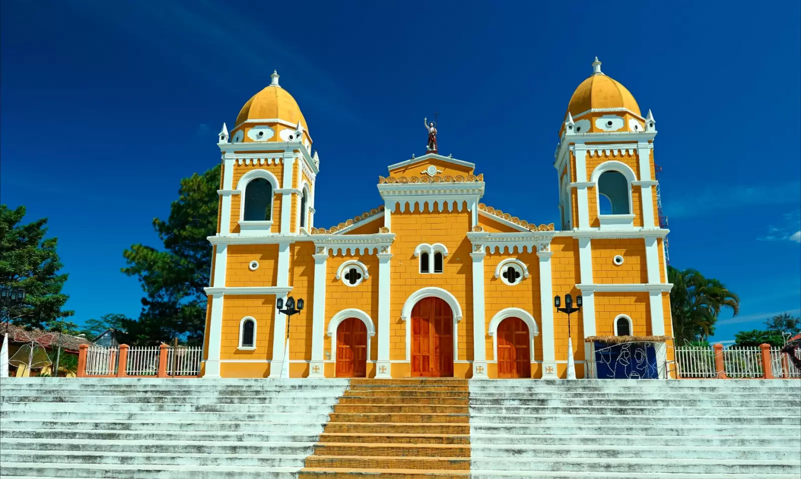 catholic colourful yellow church in nicaragua