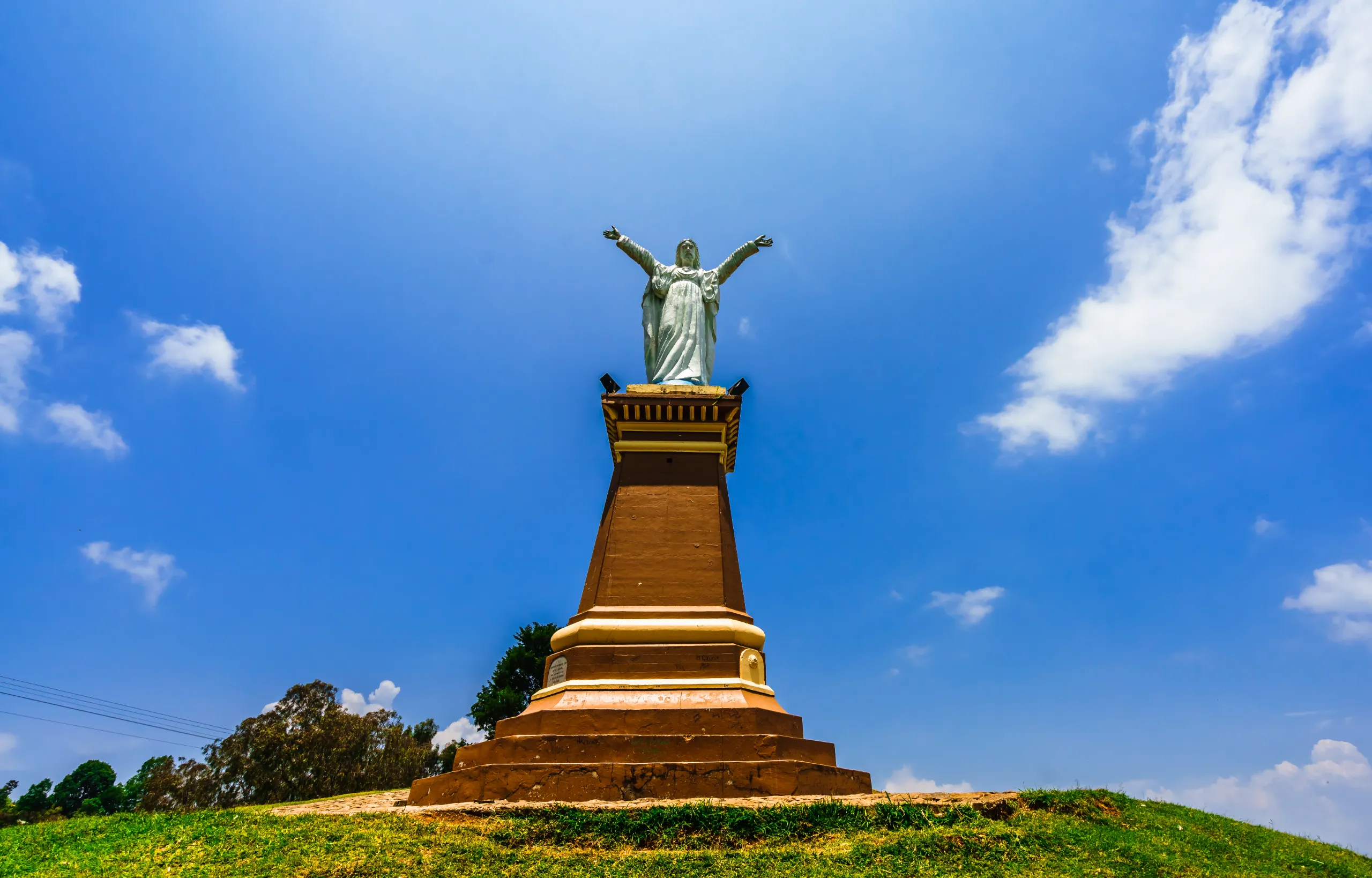 cristo statue on the hill next to village of jerico colombia
