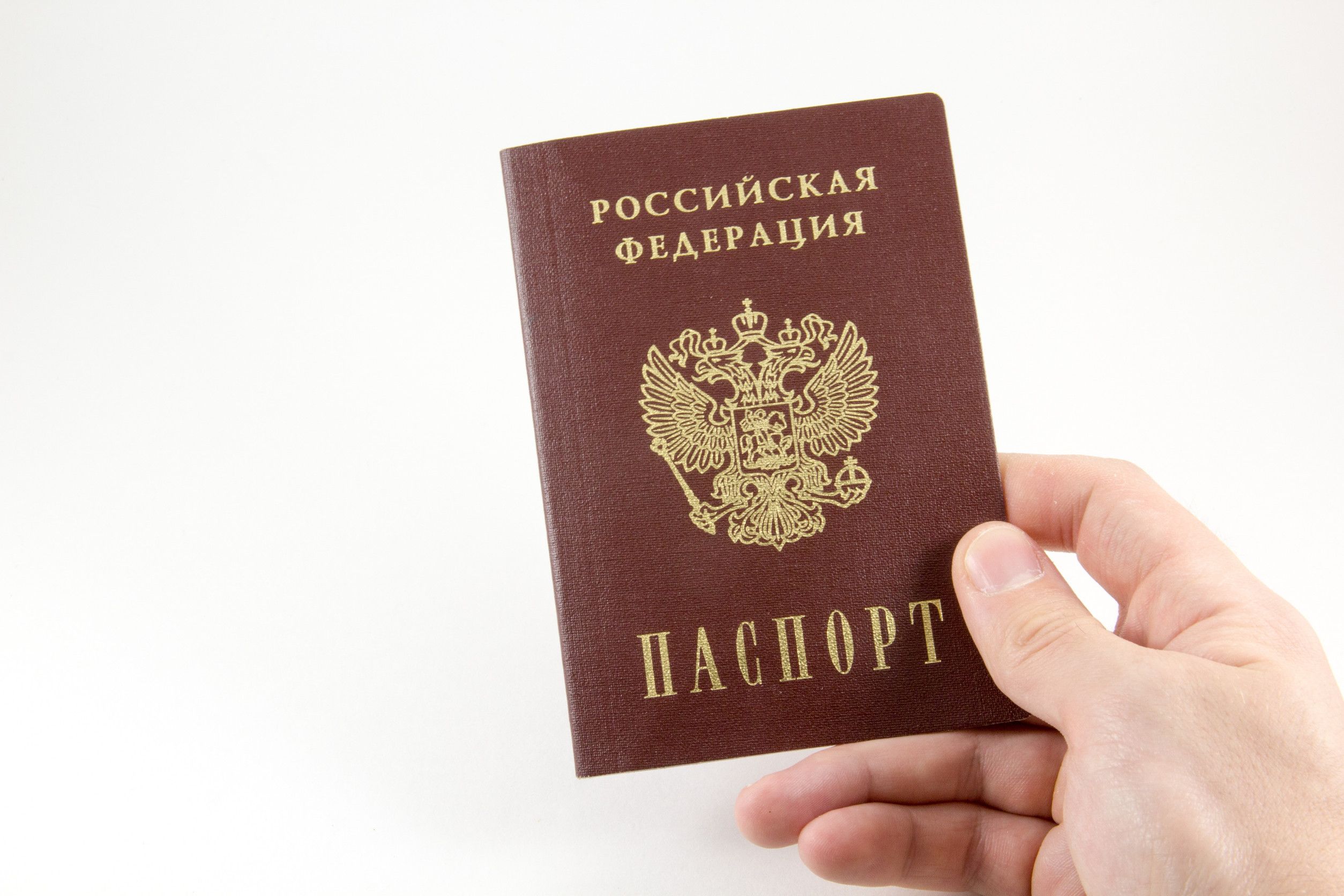 hand-holding-a-russian-federation-passport