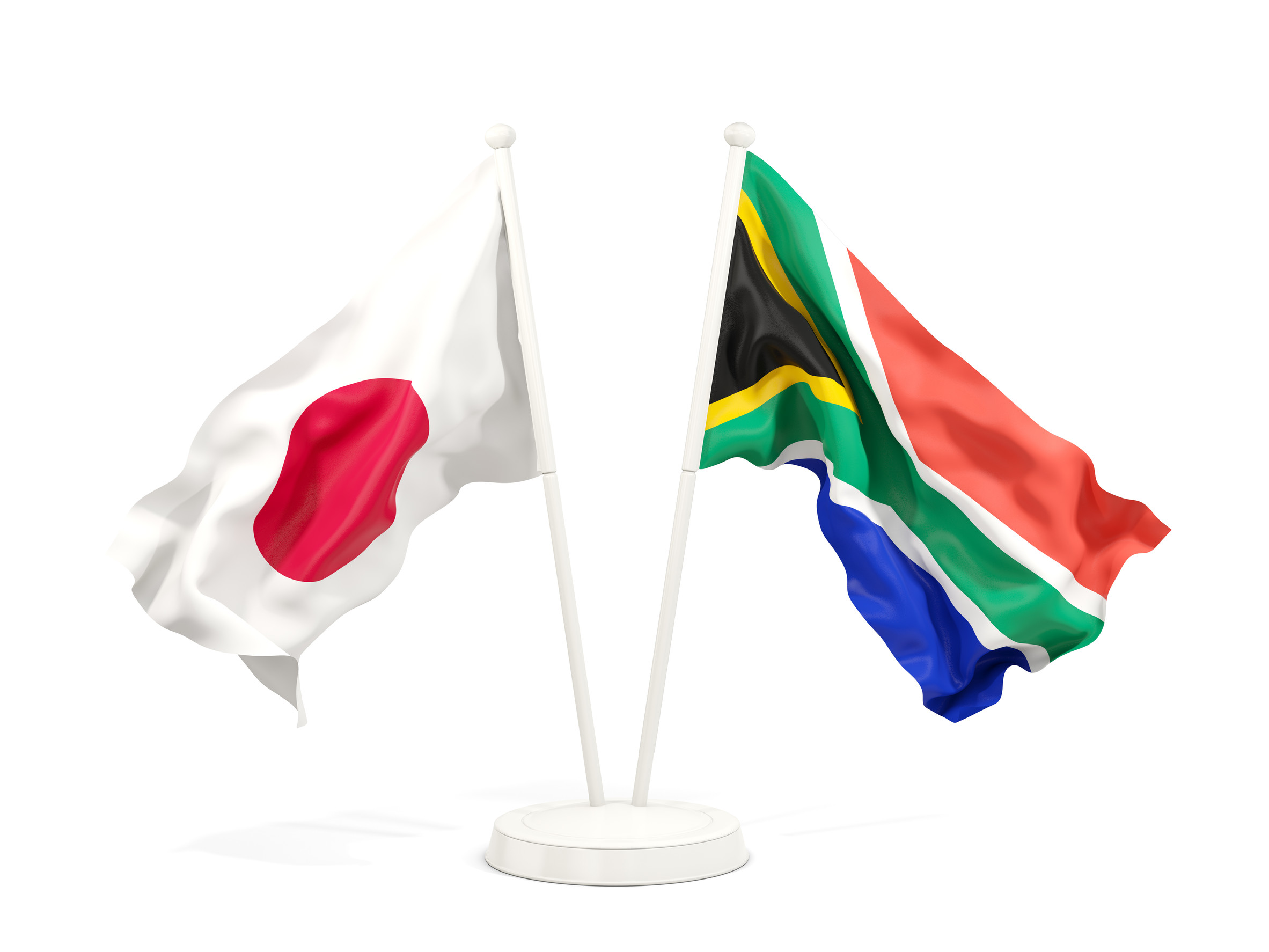 Crossed flags of Japan and South Africa on a white stand