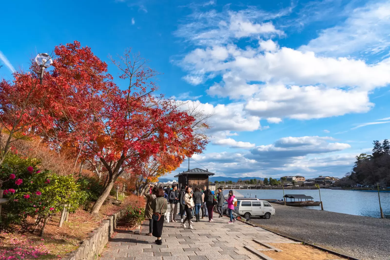 katsuragawa river with colourful forest mountain
