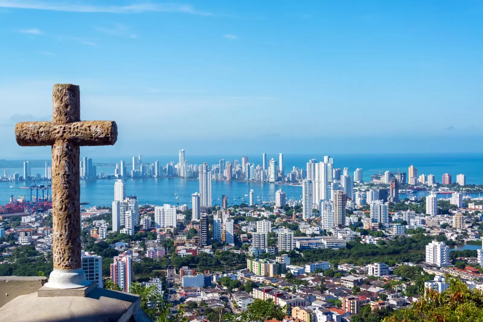 modern part of cartagena colombia with a stone cross in the foreground