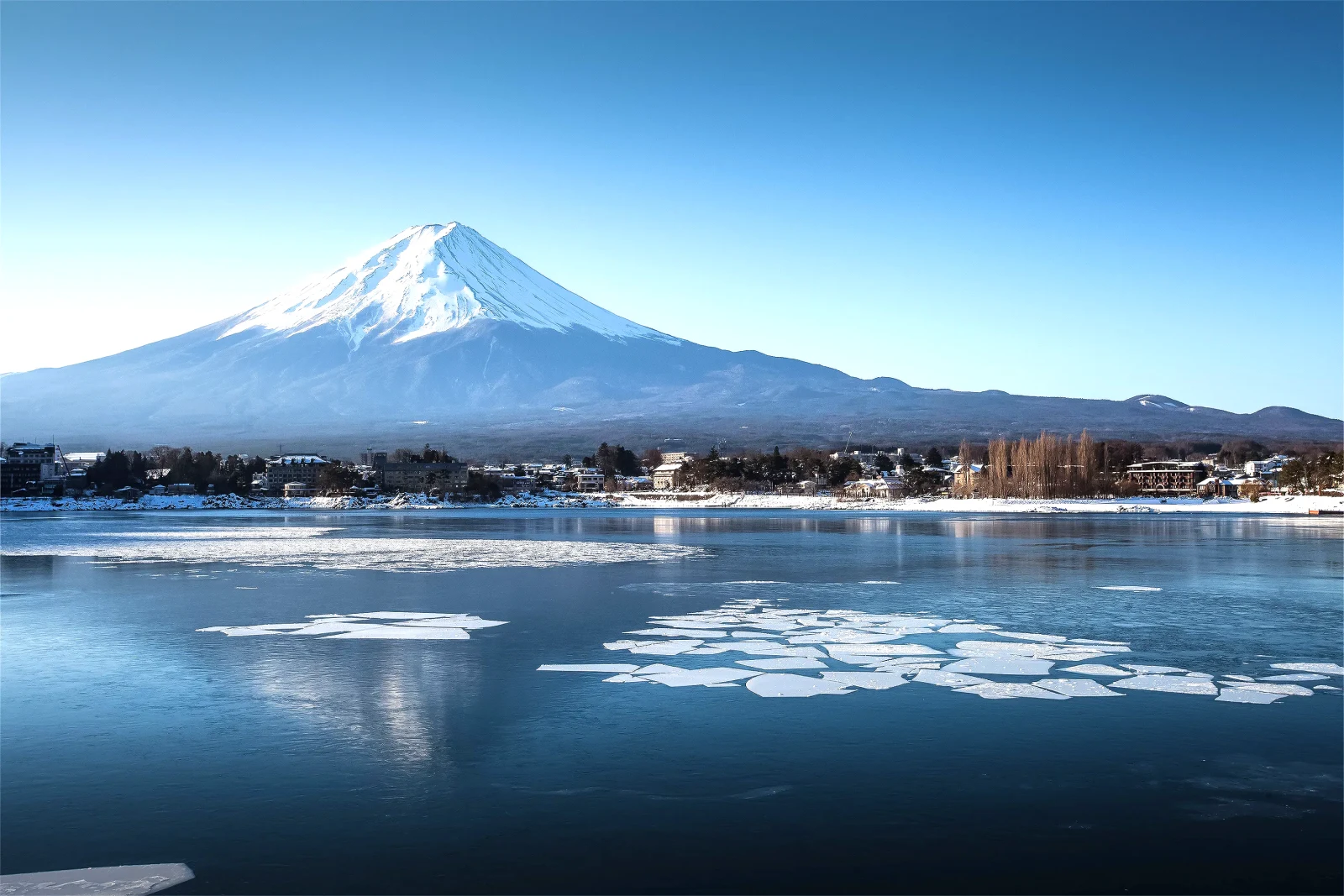 mountain fuji and lake kawagushiko with ice and snow in winter season lake kawaguchi