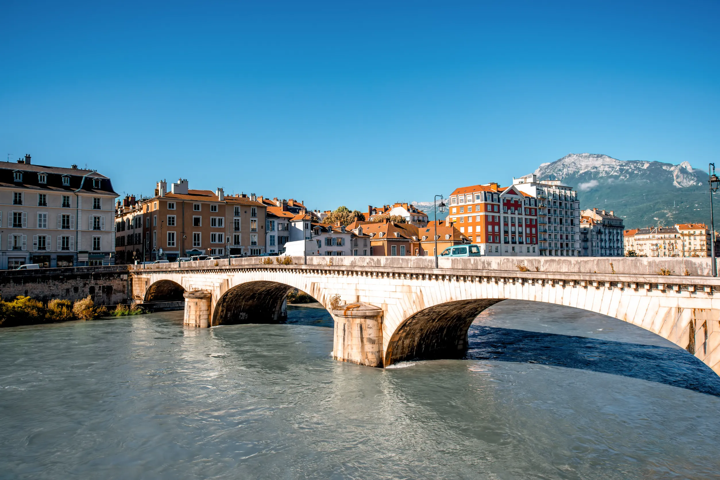 mountains river and bridge in grenoble city on the south east of france