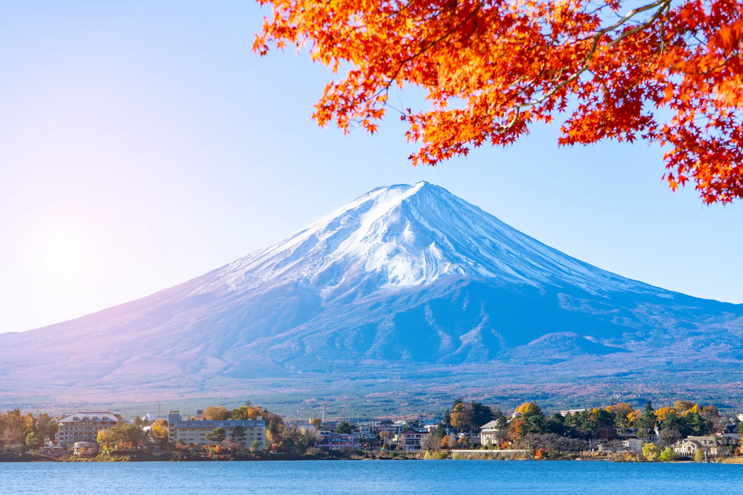 mt fuji with red maple leaf in autumn in japan