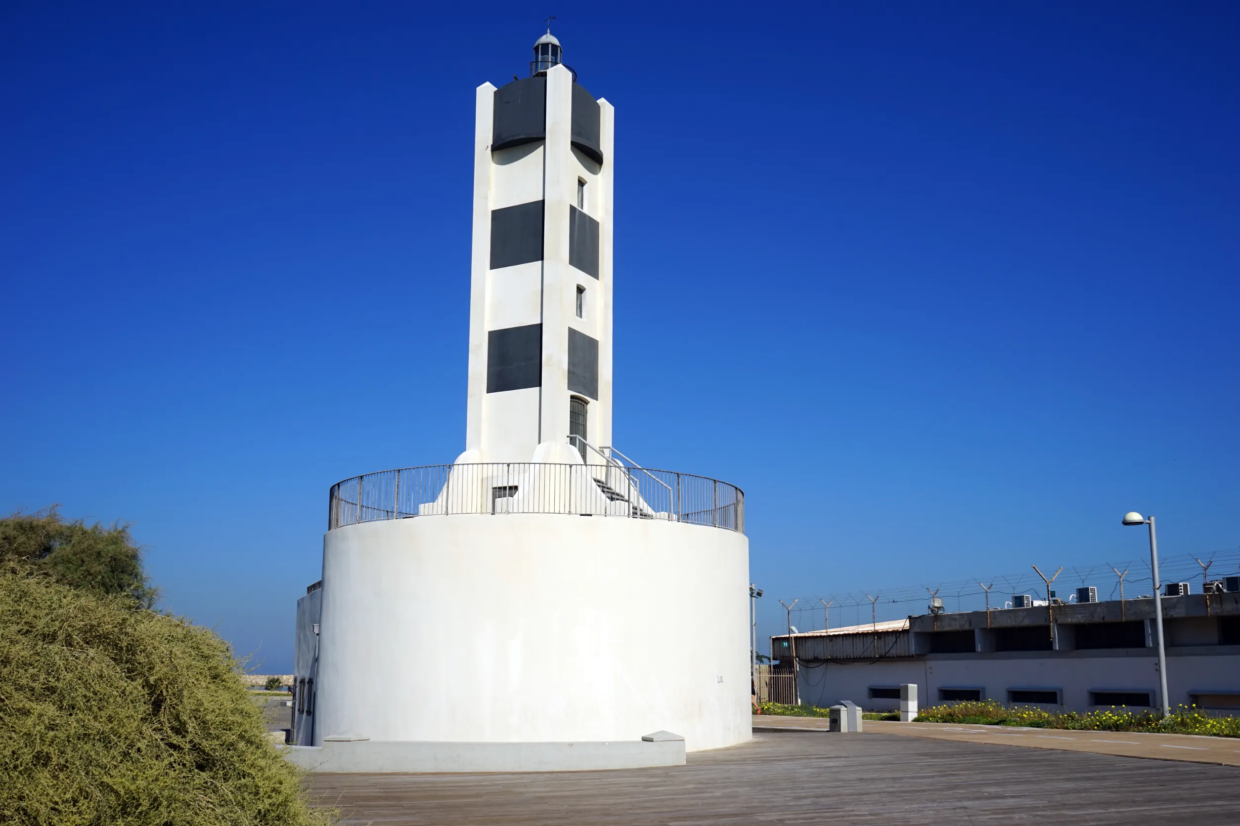 old light tower near power station in tel aviv israel