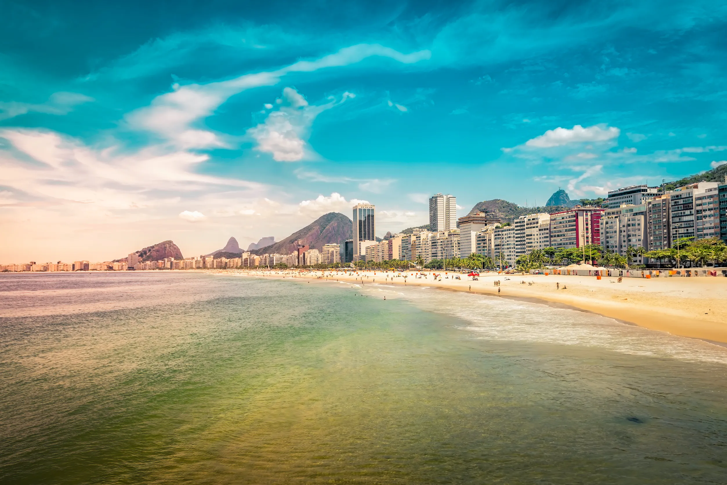 people relaxing on copacabana beach in de janeiro brazil