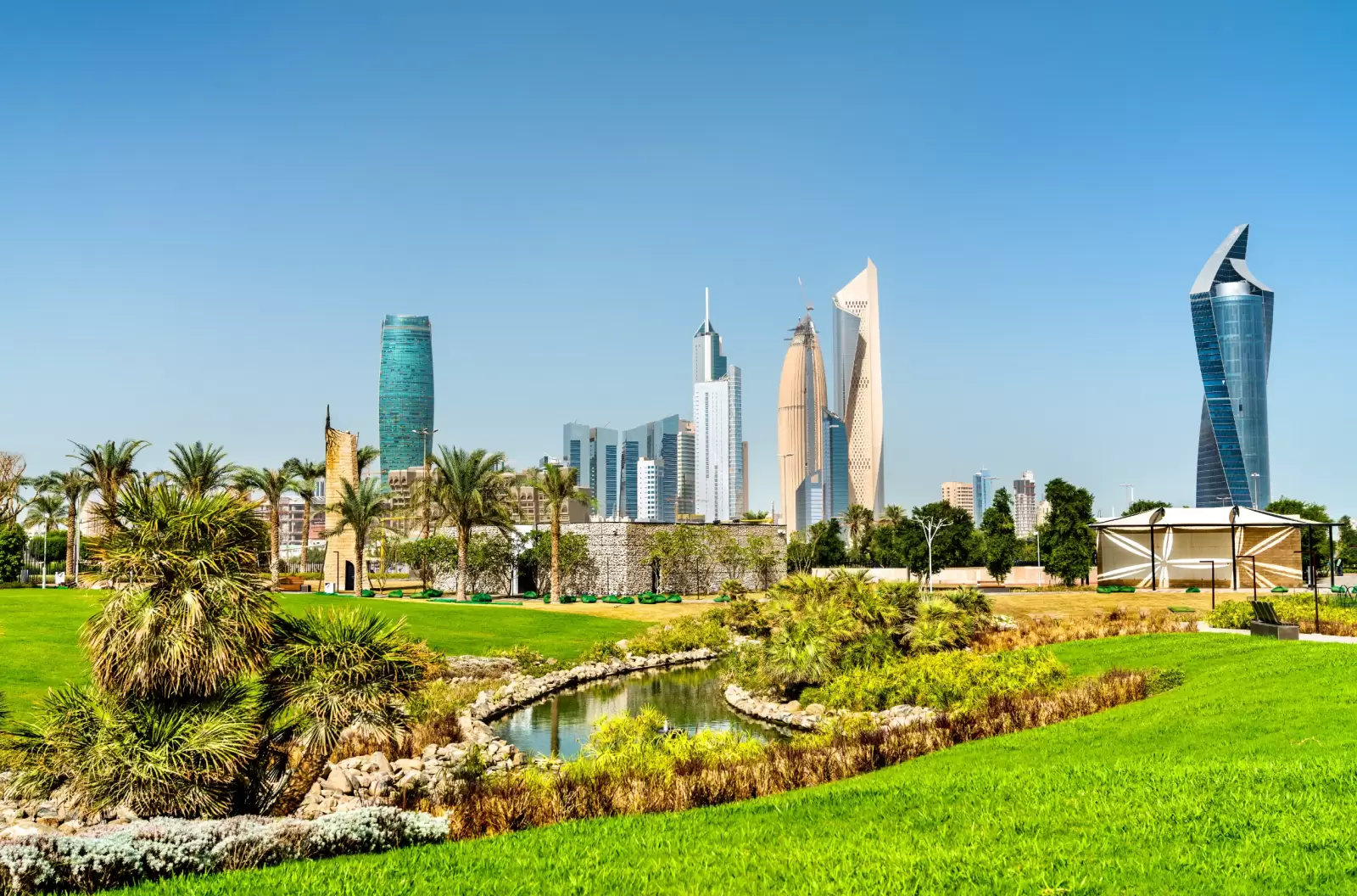 skyline of kuwait city at al shaheed park