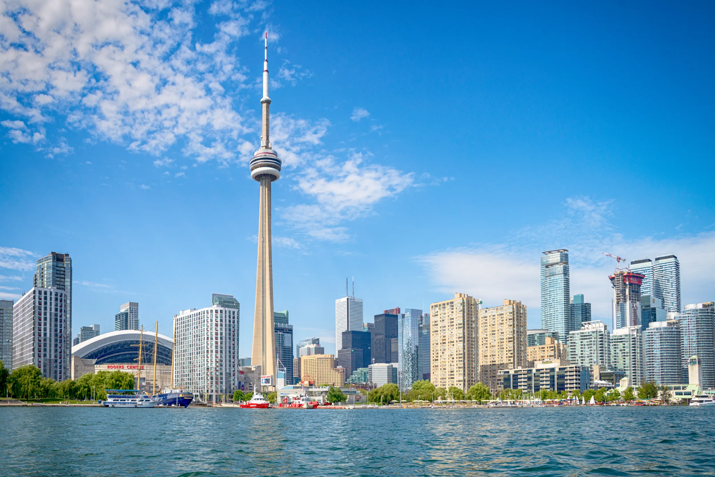 skyline of toront in canada from the lake ontario