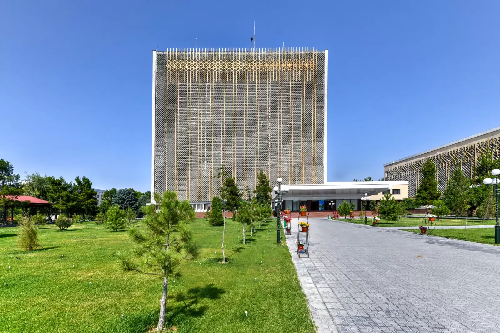 tall golden government office building in samarkand uzbekistan