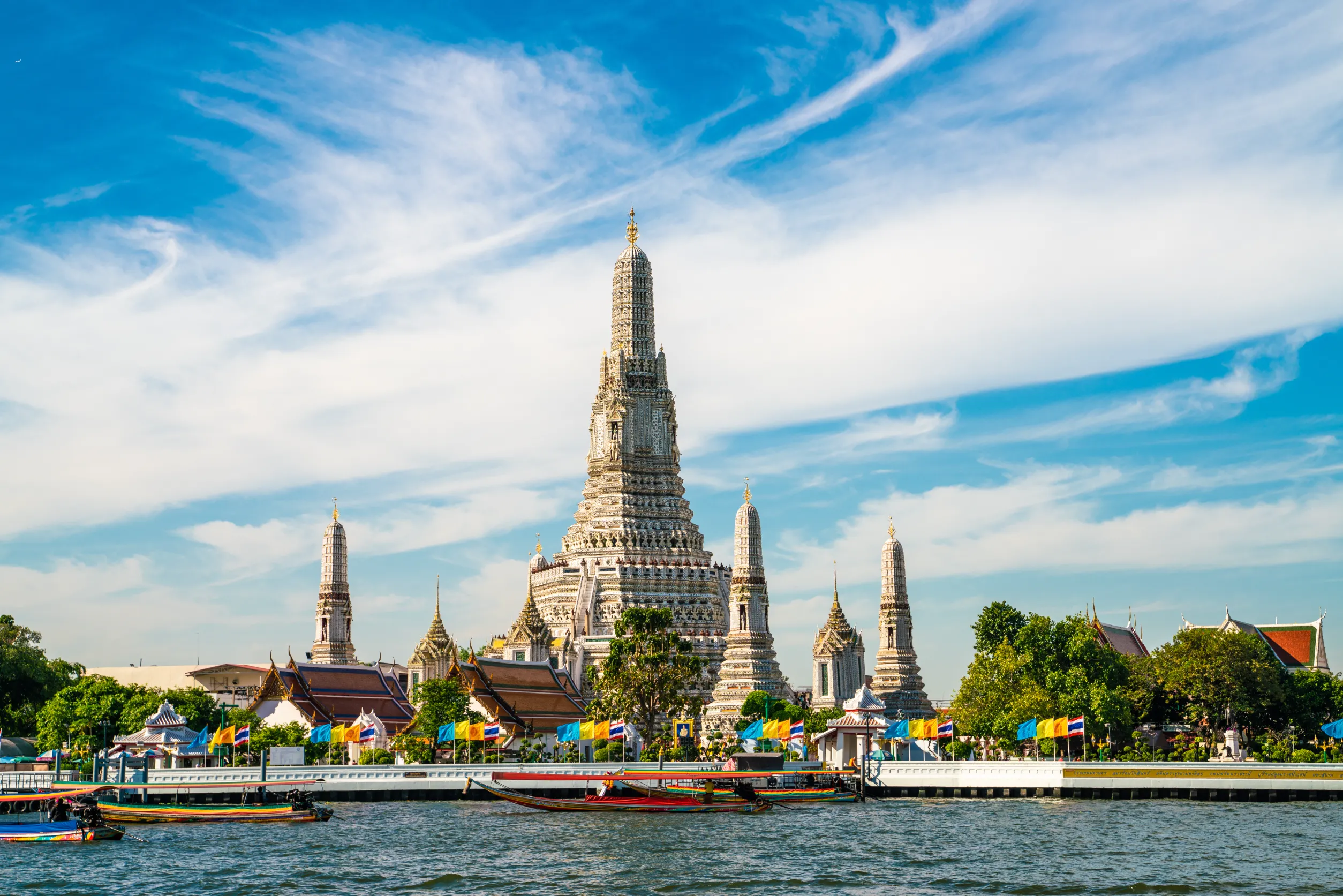 temple of dawn sunshine day with travel boat bangkok thailand