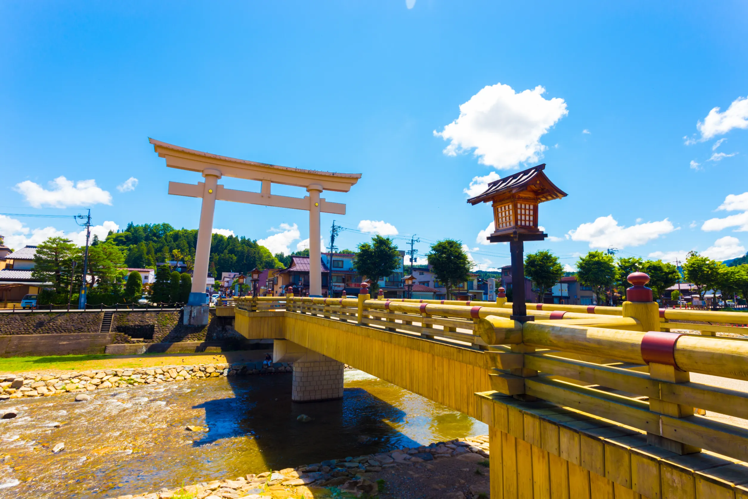 torii gate marks the entrance to the angled miyamae bashi bridge
