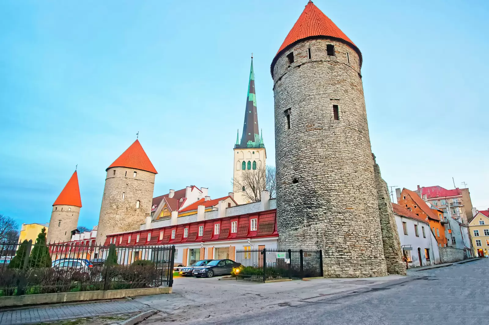 towers of the city wall and st olaf church in the old city of tallinn