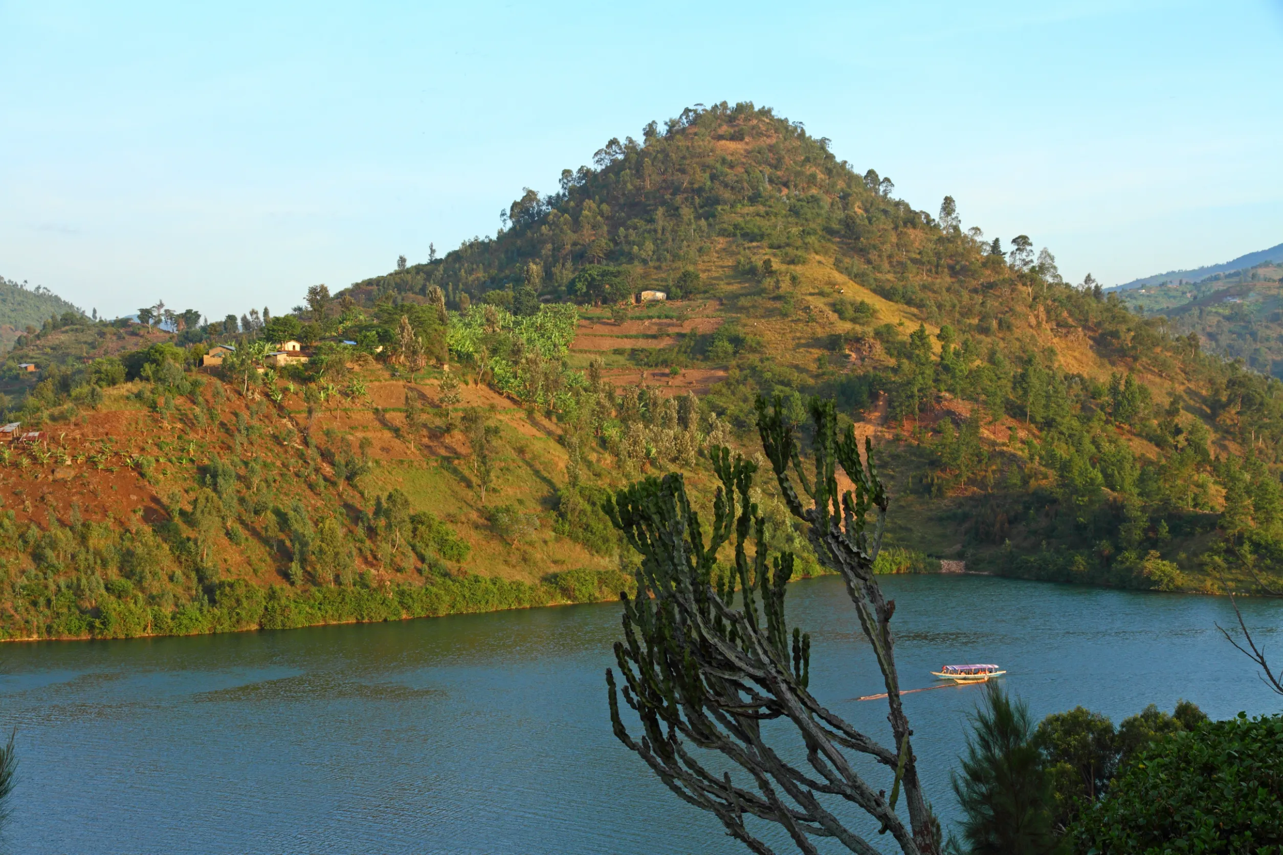 tropical lake among lush green hills