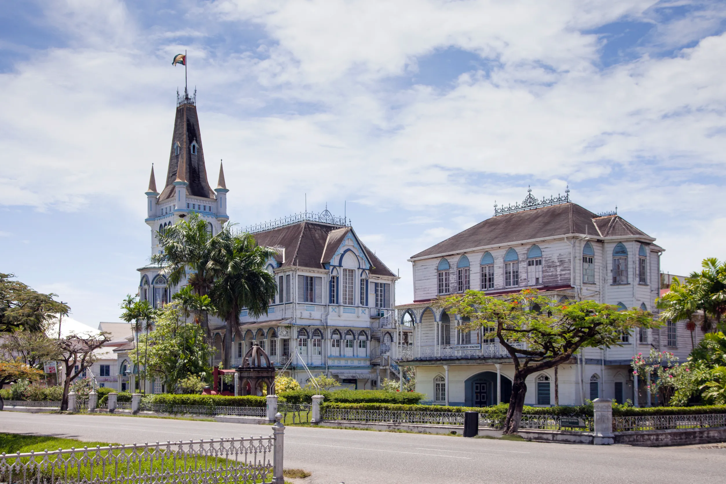 view of an old wooden fairy tale gothic building with spires and turrets