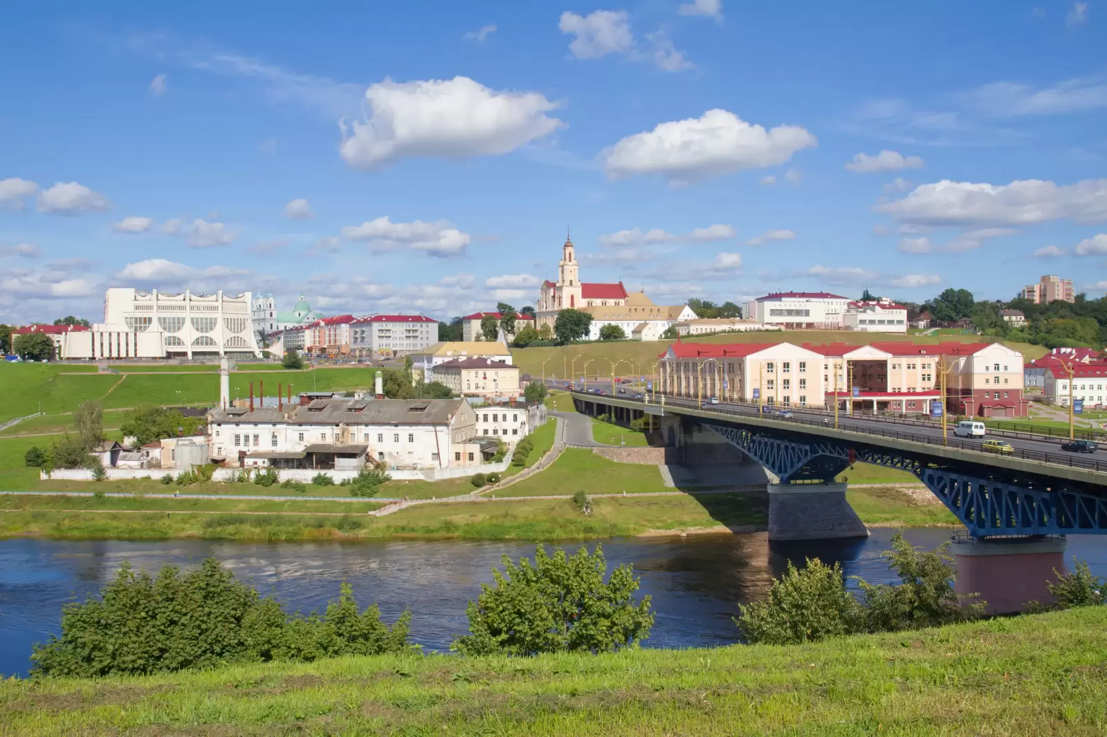view of bridge theater plant and church in grodno belarus