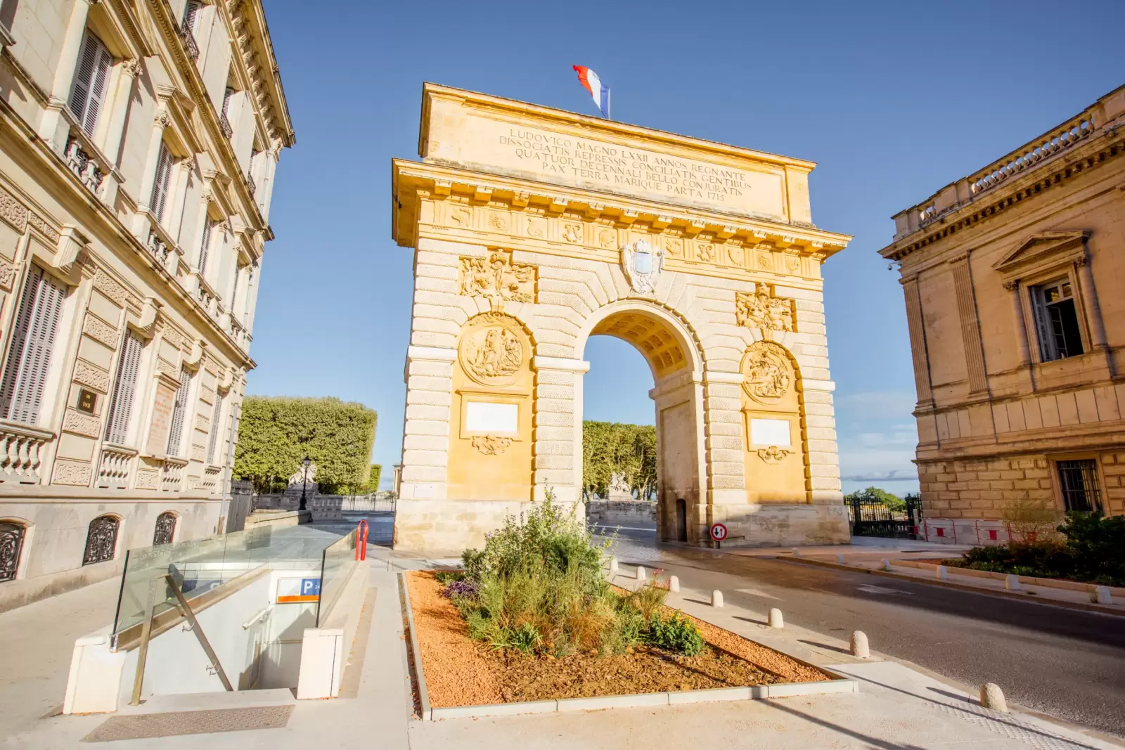 view with famous triumphal arch on the foch boulevard during the morning light in montpellier
