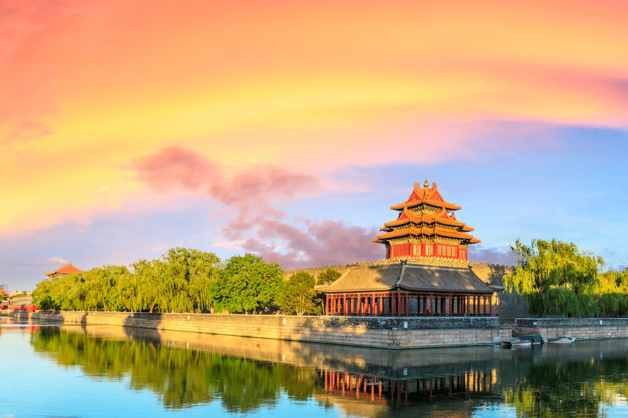 watchtower of forbidden city at sunset beijing china