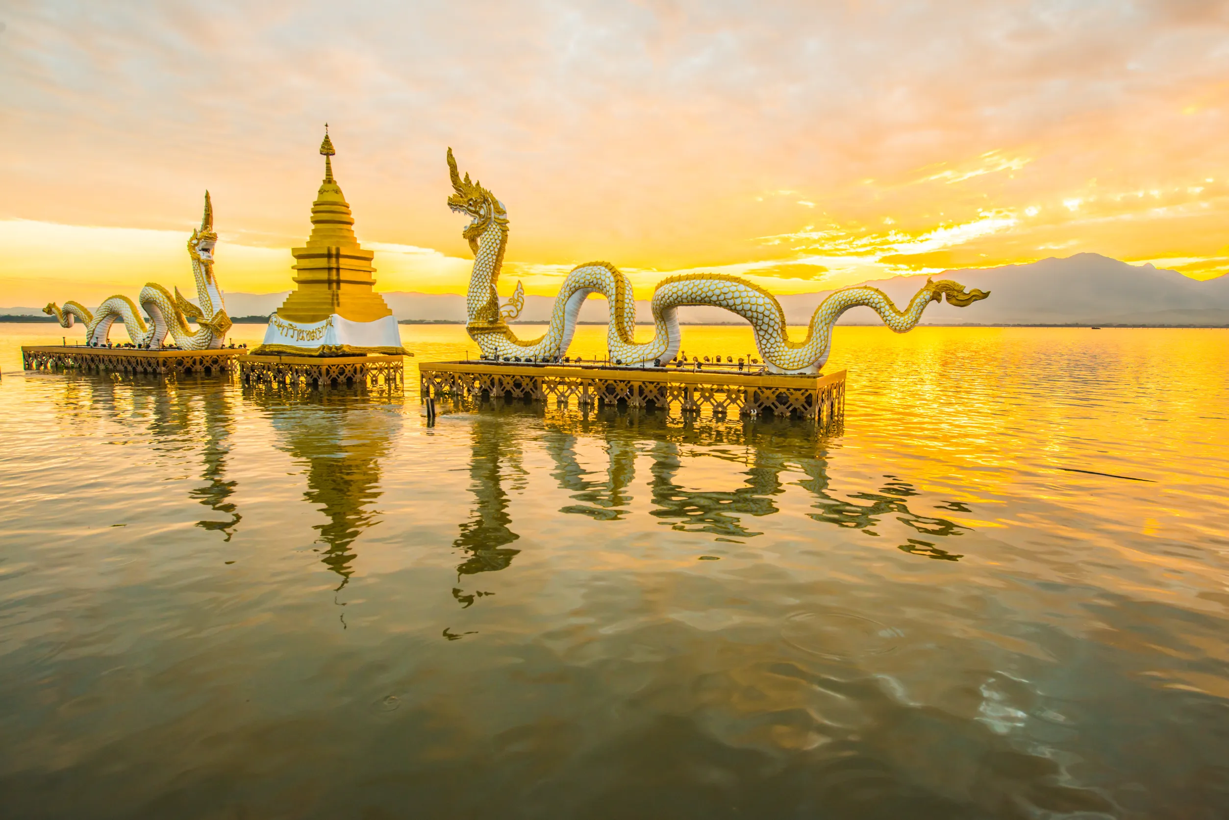 white naga statue at kwan phayao thailand